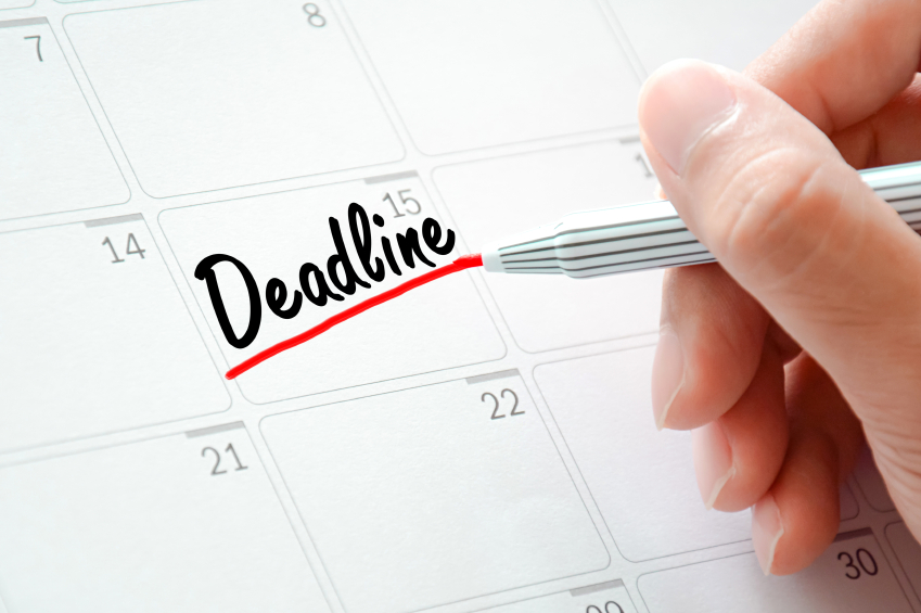 Deadline text on the calendar (or desk planner) underlined with red marker